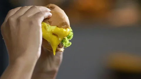Slow Motion of Mustard Dripping Off Stock-Footage 127928765