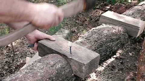 Slow motion. The nail is hammered into the board. construction Stock Footage 156937962