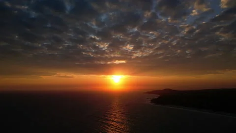 Slow motion of natural clouds at sunset from a bird's eye view. Sunset wavy Stock Footage 232634989