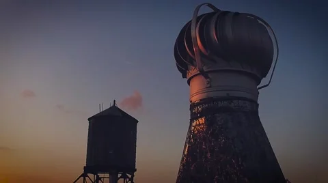 Slow motion of NYC rooftop with rotating vent and watertower Stock Footage 62782459
