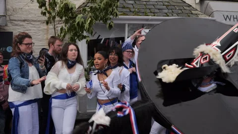 Slow motion of obby oss day in Padstow Stock Footage 242850345