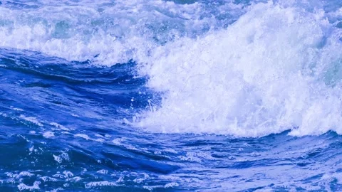 Slow Motion Ocean Blue Waves Crashing with White Sea Foam. 4K Video Stock Footage 306679084