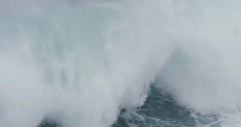 Slow motion of ocean water foaming up lightly on surface swaying in light wind Stock Footage 156130939