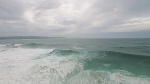 Slow motion of ocean water surface lifting up into smaller waves in strong wind Stock Footage 157151359