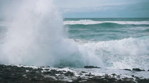 Slow Motion Ocean Waves Breaking on Shore Stock Footage 55784171