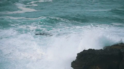 Slow Motion Ocean Waves Breaking on Shore Stock Footage 55785161
