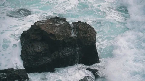 Slow Motion Ocean Waves Breaking on Shore Stock Footage 55785394