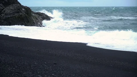 Slow motion ocean waves crashing into cliffs Video stock 72331742