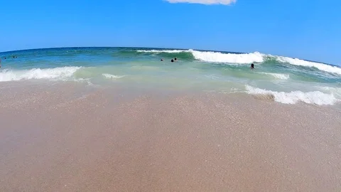 Slow Motion Ocean Waves Crashing on Beach Stock Footage