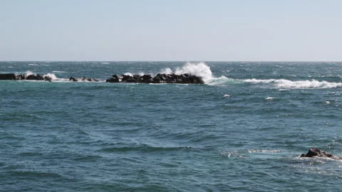 Slow motion ocean waves crashing over rocks on Atlantic coast of Portugal. Stock Footage 132226282