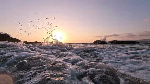 Slow Motion Ocean Waves Crashing camera and Rocks Low Angle Cinematic Goa 4K Stock Footage 332236765
