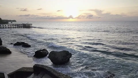 Slow motion Ocean Waves Hitting Rocks Stock Footage 183815657