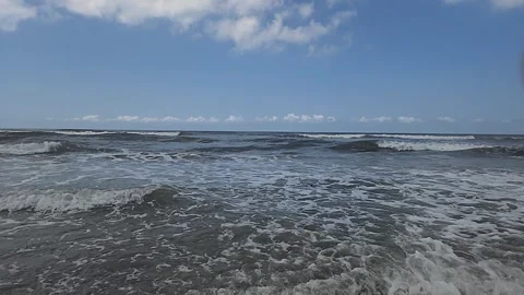 Slow Motion Ocean Waves Rolling and Breaking on Sandy Beach Stock Footage 314582575