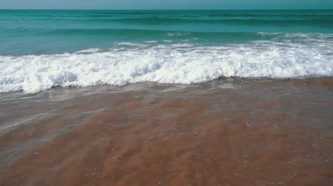 Slow Motion Ocean Waves with Sun Reflection Stock Footage 55242475