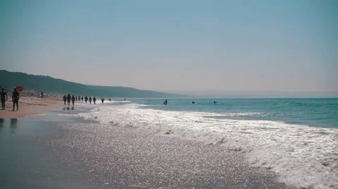 Slow Motion Ocean Waves with Sun Reflection Stock Footage 55243680