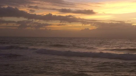 Slow Motion Ocean Waves at Sunset Stock Footage 84040113