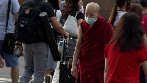 Slow motion of Old asian monk wearing face masks againt coronavirus Covid-19-Dan Stock Footage 132467217