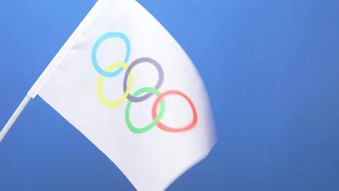 Slow motion of Olympic Games flag in the wind at horizontal composition Stock Footage 280331630
