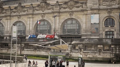 SLOW MOTION: Open Sightseeing Bus with colors of french flag in Paris Stock Footage 105239278
