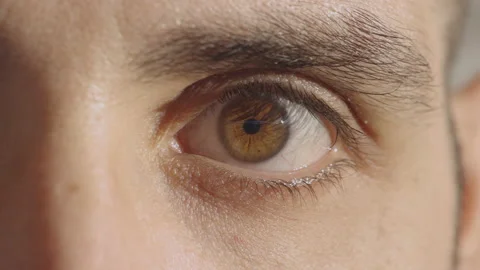 Slow Motion: Opening Eye, Iris And Eyelash Closeup Video stock 148388380