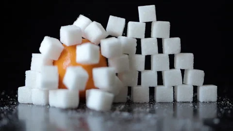 Slow Motion Orange Breaking Through Wall of Stacked White Sugar Cubes. Heal.. Stock Footage 300737464