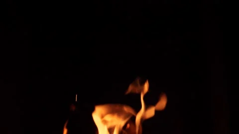 Slow motion orange flames against a black background Stock Footage 234073771