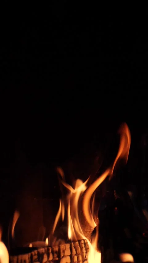 Slow motion orange flames against a black background Stock Footage 234073816