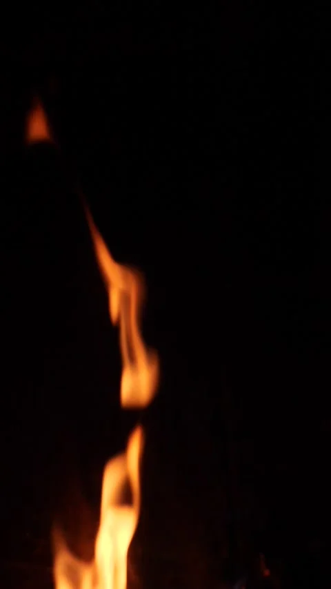 Slow motion orange flames against a black background Stock Footage 234073843