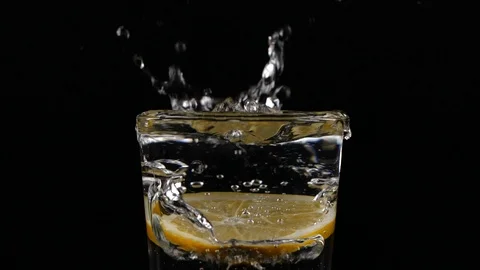 Slow motion of orange slice of lemon fruit Stock Footage 123510815