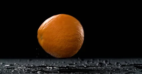 Slow motion oranges bouncing Stock Footage 55879645