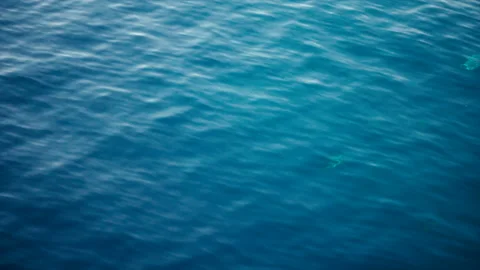Slow motion over disturbed ocean water surface, loopable. Impressive background  Stock Footage 146335889