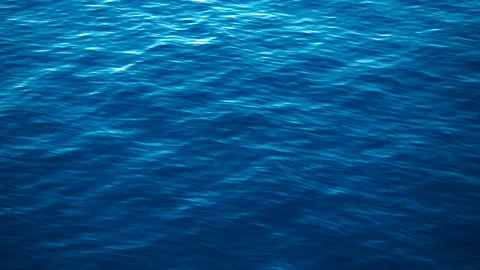 Slow motion over disturbed ocean water surface, loopable. Impressive background  Stock Footage 148333296