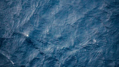 Slow motion over disturbed ocean water surface, loopable. Impressive background  Stock Footage 151274100