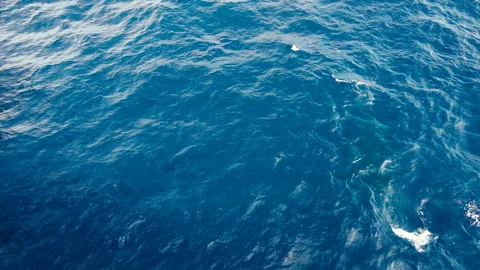 Slow motion over disturbed ocean water surface, loopable. Impressive background  Stock Footage 153912478