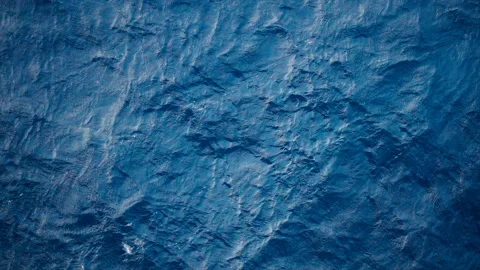 Slow motion over disturbed ocean water surface, loopable. Impressive background  Stock Footage 153924390