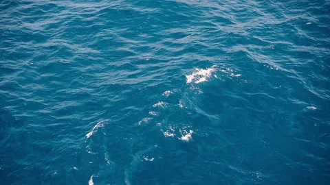 Slow motion over disturbed ocean water surface, loopable. Impressive background  Stock Footage 177929127