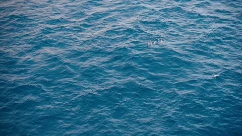 Slow motion over disturbed ocean water surface, loopable. Impressive background  Stock Footage 177929130