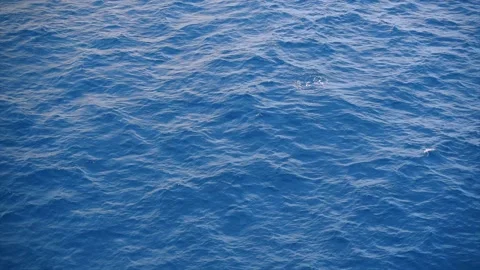 Slow motion over disturbed ocean water surface, loopable. Impressive background  Stock Footage 194382260