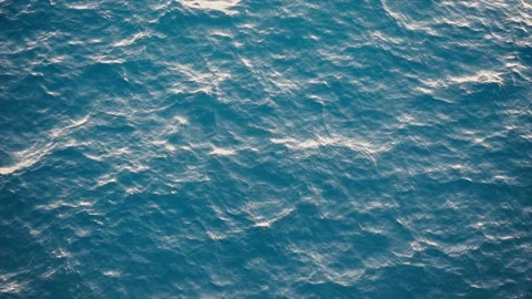 Slow motion over disturbed ocean water surface, loopable. Impressive background  Stock Footage 209131617