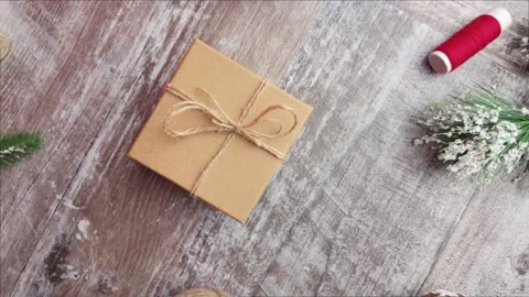 Slow motion overhead shot moving to the right across a rustic wooden table .. Stock Footage 321545070