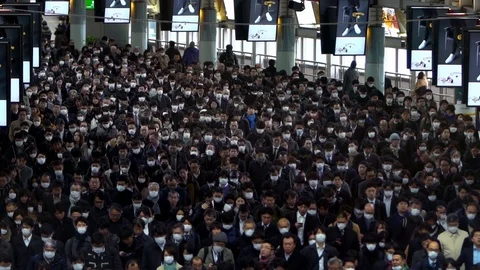 Slow motion overhead view of Japaneses travellers wear mask at metro station-Dan Stock Footage 124397735