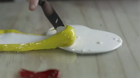 Slow motion paint mix with chisel Video stock 160517746