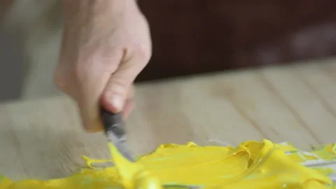 Slow motion paint mix with chisel Stock Footage 160518372
