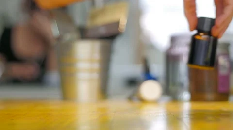 Slow motion of painter preparing colors on working table closeup Stock-Footage 59310977