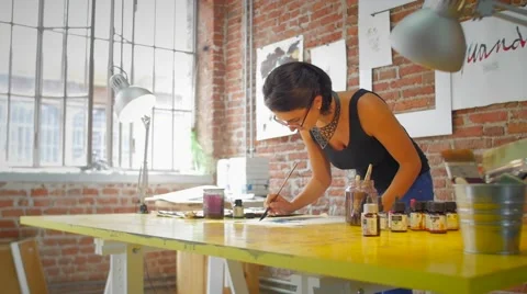 Slow motion of painter working wide shot slidecam Stock Footage 59311263