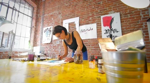 Slow motion of painter working wide shot slidecam 스톡 동영상 59311360