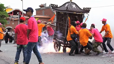 Slow motion palanquin of procession passing over firecrackers explode Taiwan-Dan Stock Footage 91418241