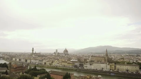 Slow motion pan above the ancient rooftops of rainy Florence, Italy Video stock 114603800