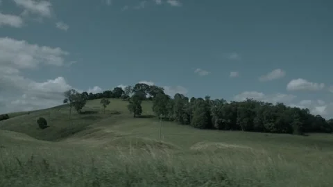 Slow Motion Pan Across Rolling Green Hills in Sunshine Coast Hinterland, Queensl Stock Footage 341298014