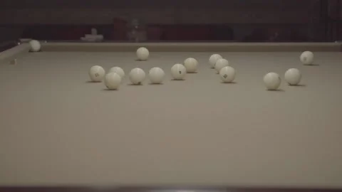 Slow motion pan. Breaking the billiard pyramid. Opening break shot Stock Footage 142682901